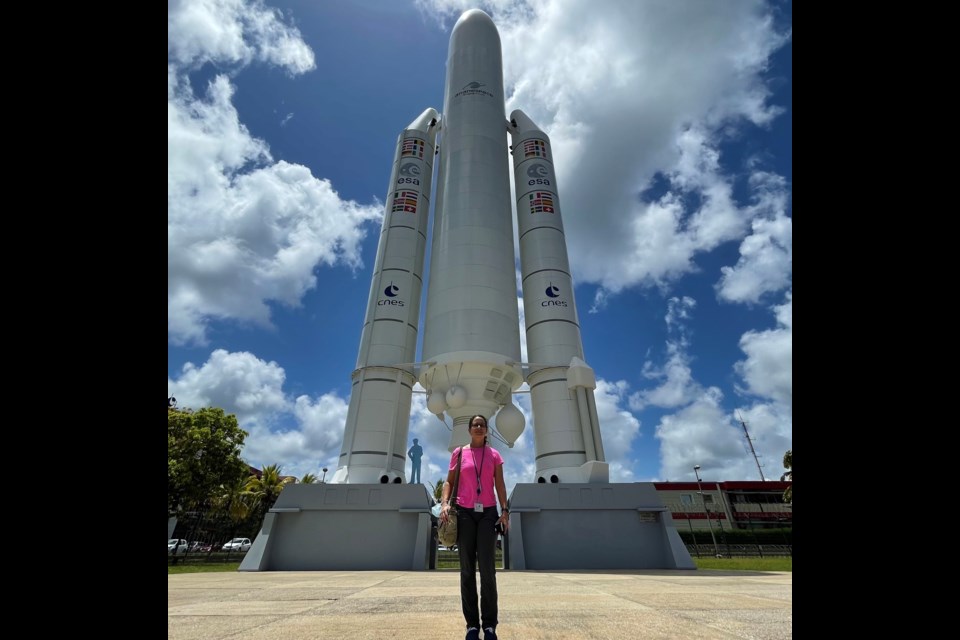 Lakehead University chemical engineering grad (1999) Colette Lepage is pictured in French Guiana during preparations for the Dec. 25, 2021 launch of the James Webb Space Telescope. The Ariane 5 rocket in the background is a mockup of the same type of rocket JWST flew on. (submitted photo)