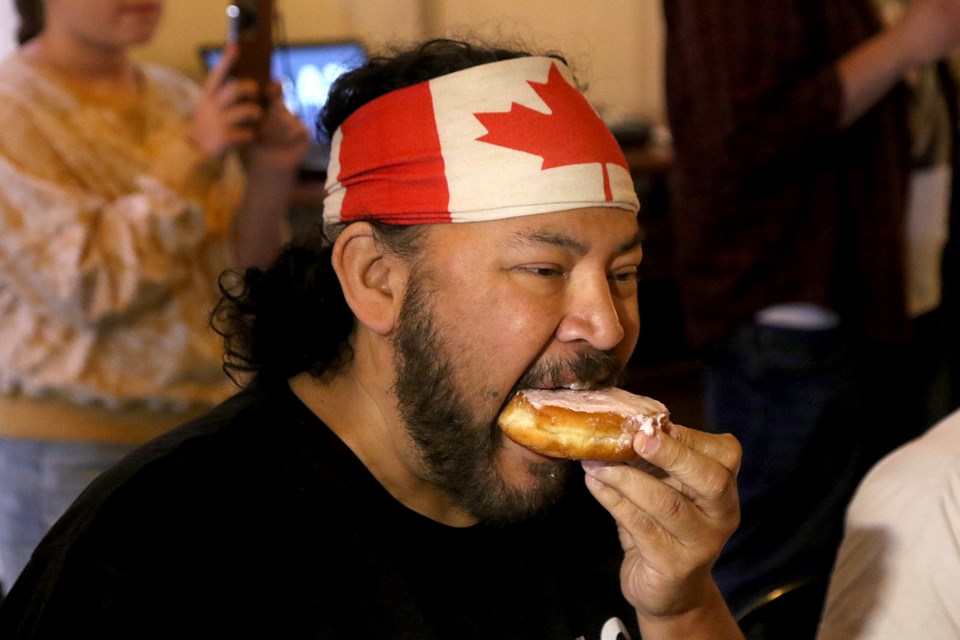 Stan Alto takes part in the Red Lion Smokehouse's Persian Eating Contest on Friday, July 1, 2022. (Leith Dunick, tbnewswatch.com)