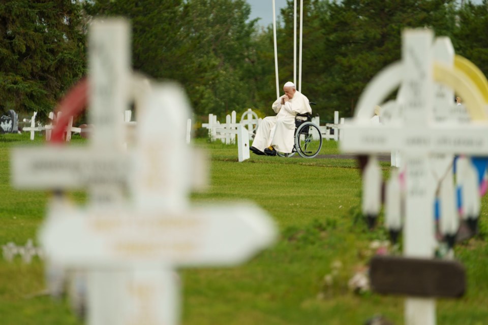 Pope Francis reflects at a graveyard in Maskwacis First Nation on Monday, July 25, 2022, during a visit to Canada to apologize to Indigenous Peoples for the Catholic Church's role in the residential school system. (Prime Minister's Office photo)