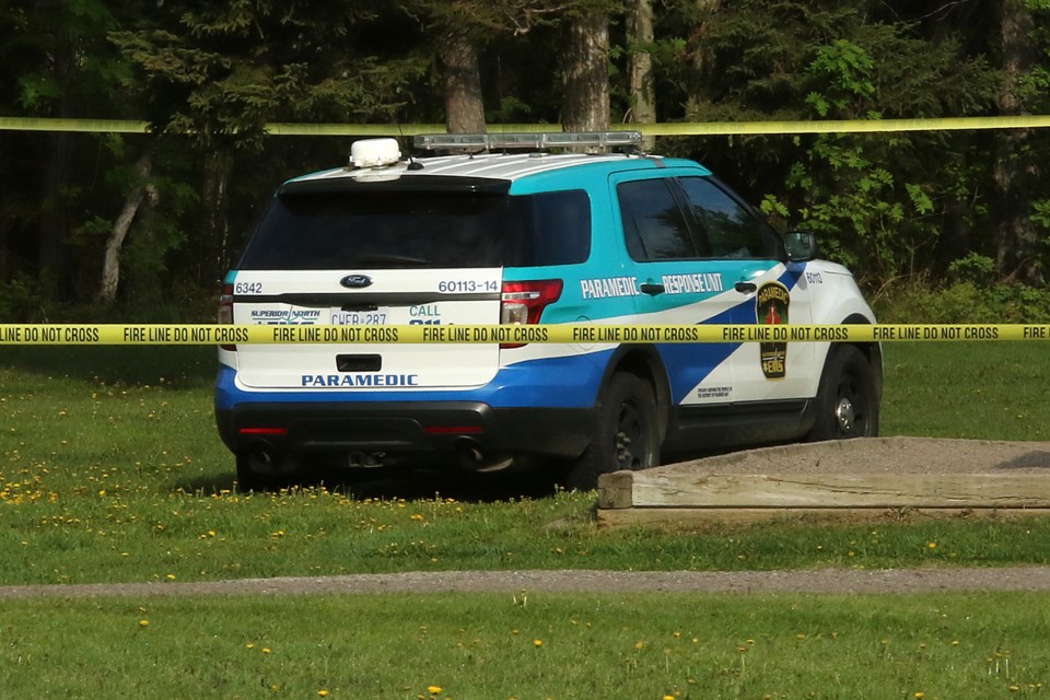 Superior North EMS paramedics are on scene at Junot Park on Wednesday, June 8, 2022 after a body was discovered. Police are also on scene. (Leith Dunick, tbnewswatch.com)