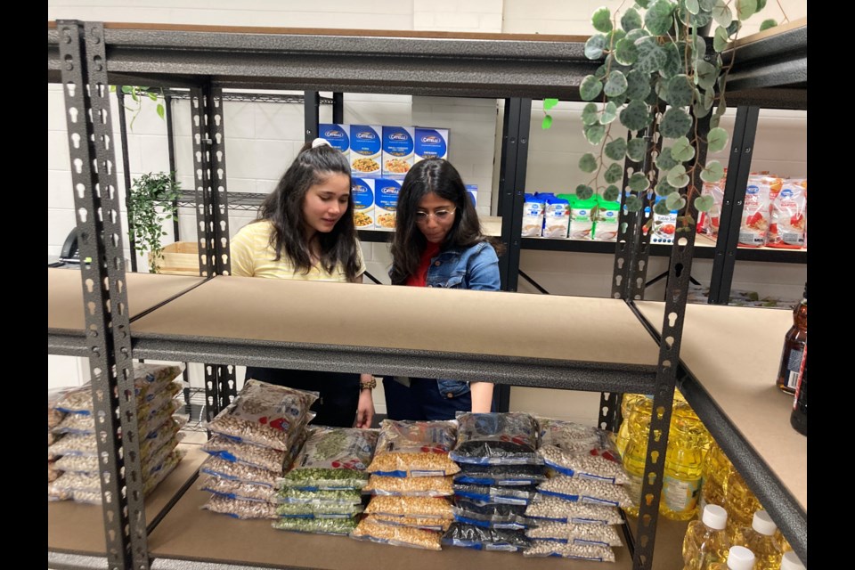 Lakehead University students Mann Koner and Marteena Aalhano said they were impressed with the revamped Food Resource Centre at its opening on June 20, 2022.