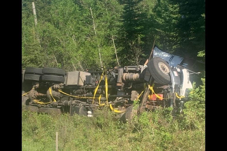 A driver was extricated from the wreckage after his tractor-trailer left the roadway on Highway 11/17 in Shuniah on Jun. 22, 2022 (Skilled Truckers Canada/Facebook)