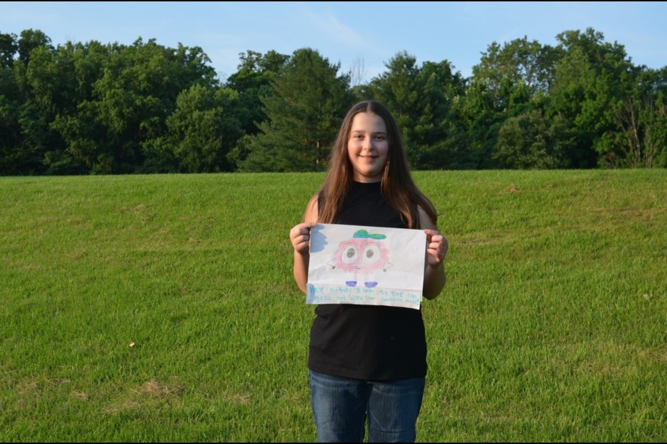Sophia Warnick, 10, of Lakehead Virtual School is the winner of the Our Hands T-Shirt Challenge.
