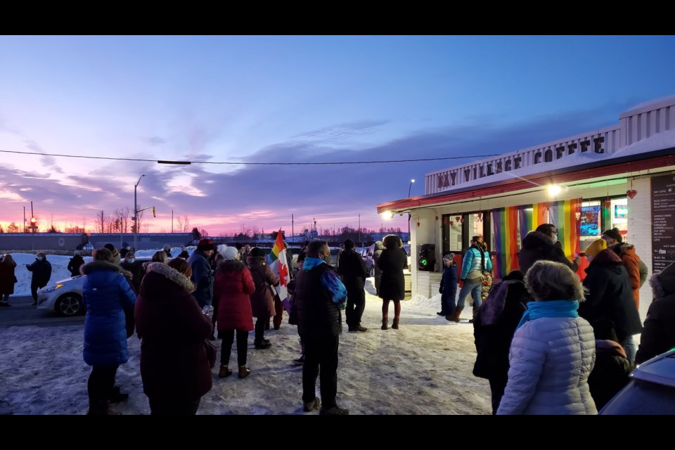 About 200 people gathered at sunrise Friday to show support for Bay Village Coffee after it was targeted with a rock thrown through its window and homophobic messages. (Adam Riley, TBT News)