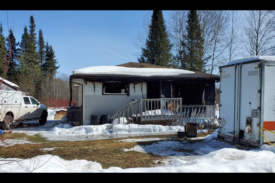 This house in Red Rock sustained heavy damage in a suspected arson fire on Mar. 18, 2022 (Adam Riley/TBTV)