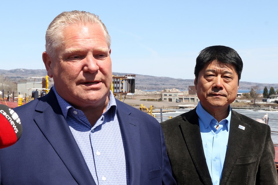 Conservative Leader Doug Ford (left) and Thunder Bay-Superior North candidate Peng You aboard the Tim S Pool cargo ship at Heddle Marine on Saturday, May 7, 2022. (Leith Dunick, tbnewswatch.com)
