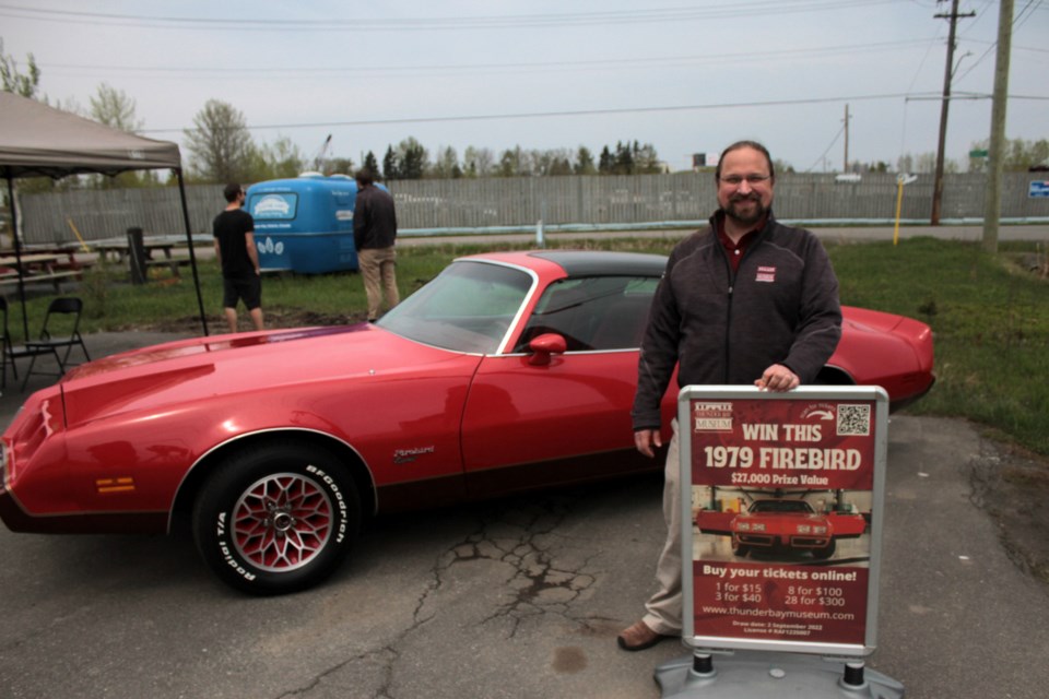 This year’s raffle features a 1979 Pontiac Firebird Esprit, Redbird Edition