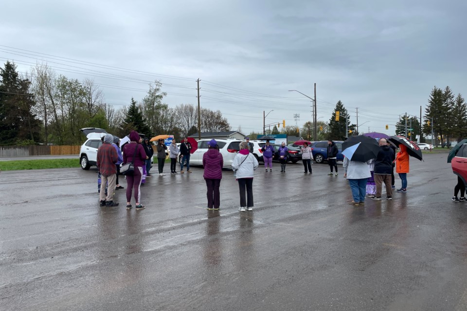 The group started off their walk at the Arthur Street Walmart parking lot and headed east towards the Kam river heritage park