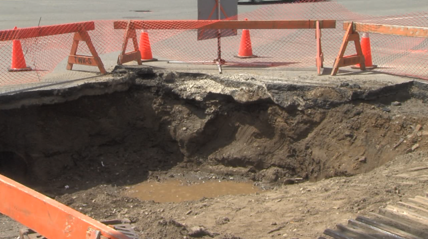 A sinkhole developed Monday in the northbound lanes of Edward Street at Arthur St. (Jessah Clement/TBTV photo)