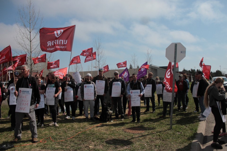 Around 70 residents gathered at Friendship Gardens to show their outrage towards the treatment of long-term care workers