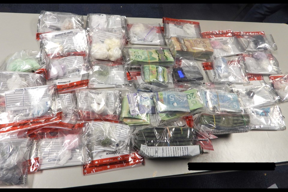 The Thunder Bay Police Service reports seizing large amounts of fentanyl, crack cocaine, and cash. (TBPS handout)