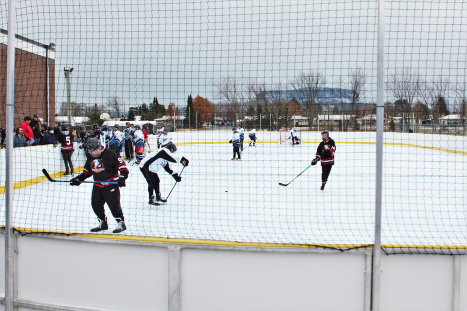 A new outdoor rink at Dennis Franklin Cromarty High School will operate year-round thanks to a synthetic ice surface. (Photos by Ian Kaufman, TBnewswatch)