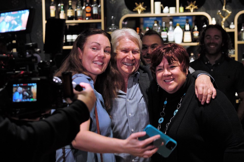 Ken Boshcoff celebrates his victory in Thunder Bay's mayoral race on Monday night along with Shelby Ch'ng (left) and Kristen Oliver, who were also reelected to council. (Ian Kaufman, TBnewswatch)