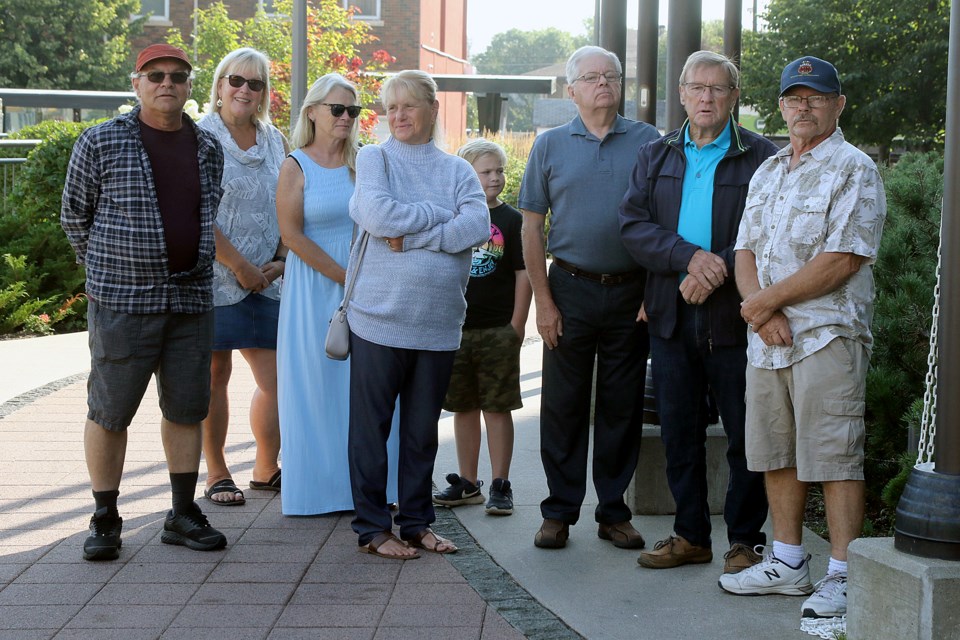 Members of the late Thornley Christiansen's family helped raise the Red Ensign Flag on Friday, Sept. 2, 2022, a day ahead of Canadian Merchant Navy Day. (Leith Dunick, tbnewswatch.com)
