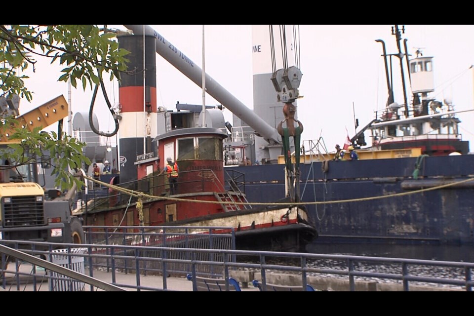 The historic James Whalen tugboat was raised from the Kaministiquia River on Thursday. (Leigh Nunan, TBT News)