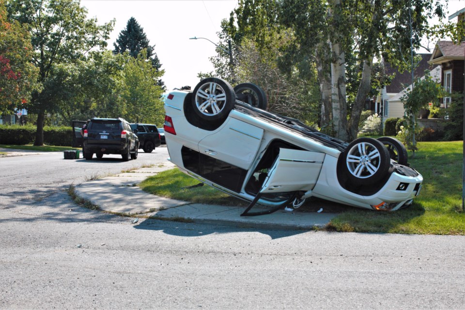 A vehicle overturned after a collision near the of Whitney Street and Winnipeg Avenue on Monday. (Ian Kaufman, TBnewswatch)