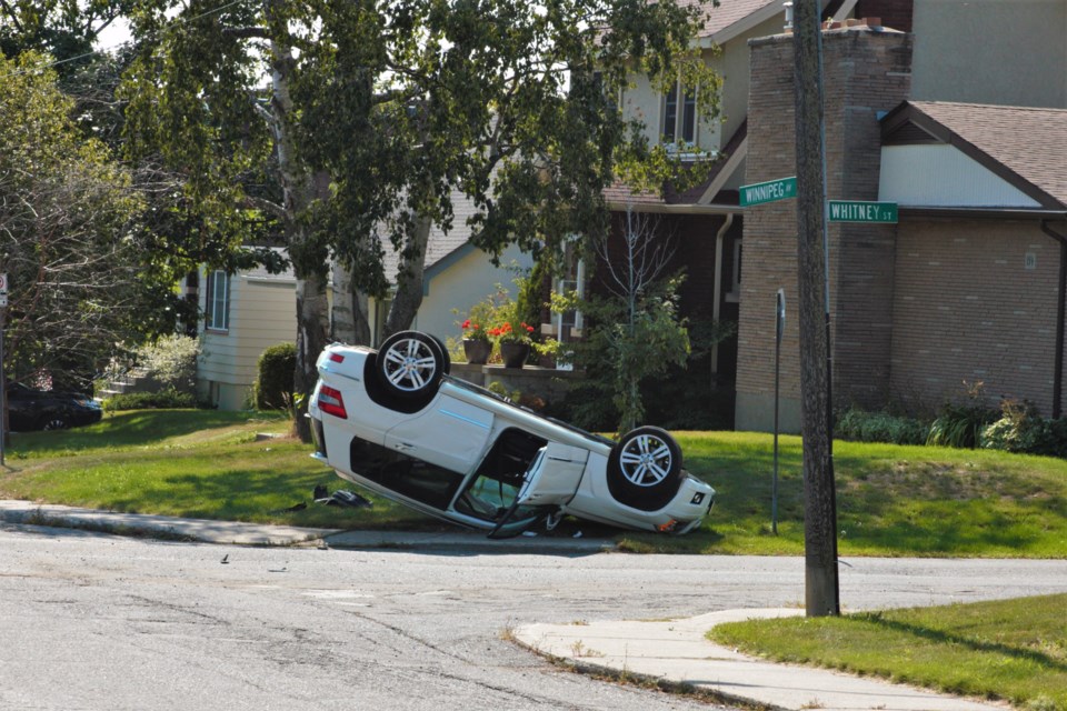 A vehicle overturned after a collision near the of Whitney Street and Winnipeg Avenue on Monday. (Ian Kaufman, TBnewswatch)