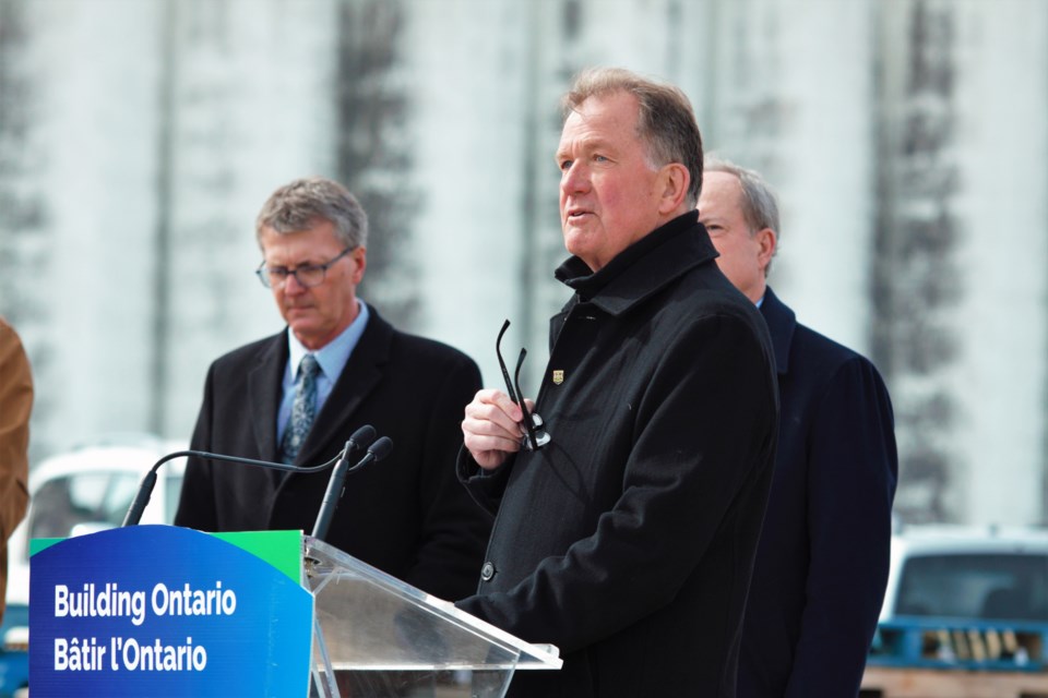 Minister of Mines George Pirie highlights expanded funding for junior exploration companies in Thunder Bay on April 19. (Photos by Ian Kaufman, TBnewswatch)