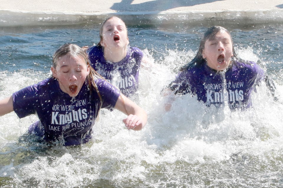 Student teams, including a group from NorWesterview Public School, took part in the Thunder Bay Polar Bear Plunge on Saturday, April 1, 2023 at Prince Arthur's Landing. (Leith Dunick, tbnewswatch.com)