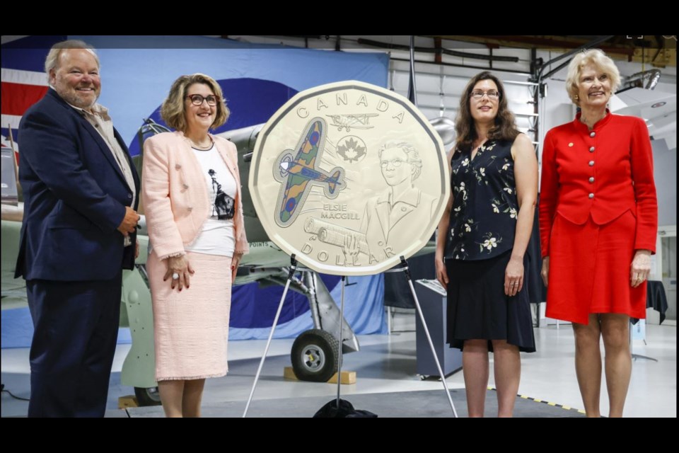 From left, Elsie MacGill's grandson Rohan Soulsby, Royal Canadian Mint CEO Marie Lemay, biographer Crystal Sissons and RCM board chair Phyllis Clark unveil a $1 commemorative coin (Royal Canadian Mint/CNW Group photo)