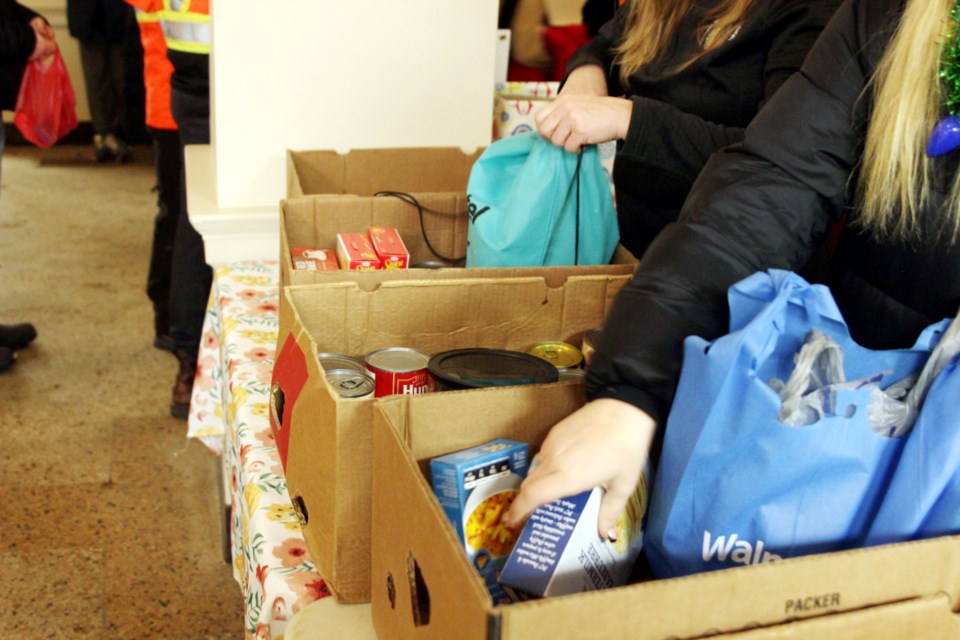 Food donations were accepted to help support local food banks