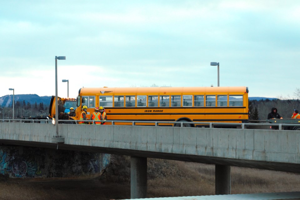 A school bus appeared to be involved in a collision on a Highway 61 overpass just south of the Thunder Bay Airport on Tuesday.