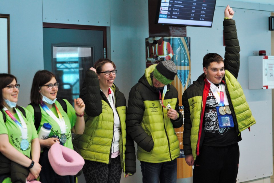 Special Olympics competitors celebrated after returning from Special Olympics provincial qualifiers held Feb. 25 and 26 in Huntsville. (Ian Kaufman, TBnewswatch) 