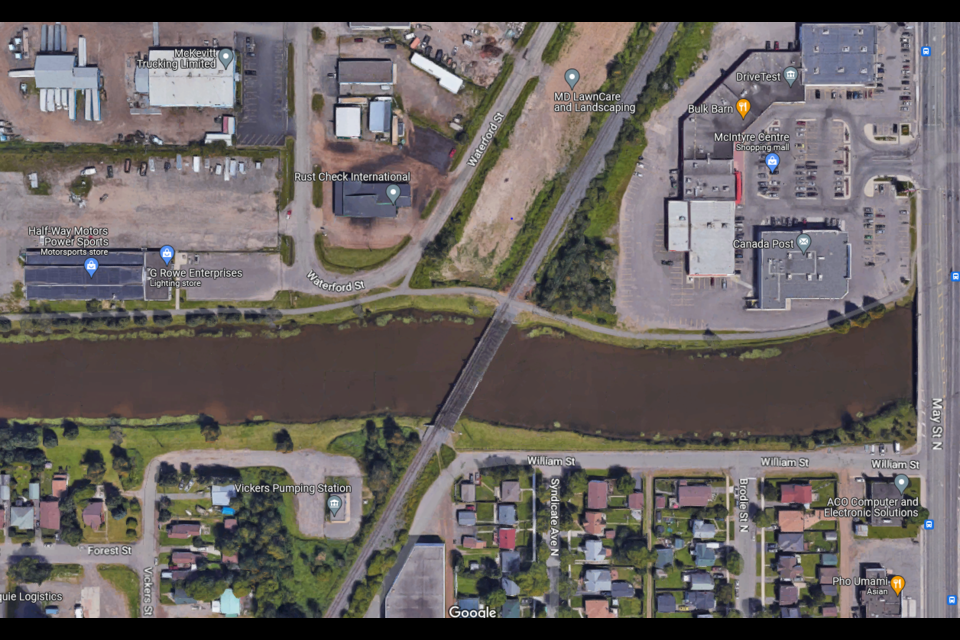 The Vickers-Carrick bridge would carry pedestrian and cycling traffic across the Neebing-McIntyre floodway, just west of May Street and a nearby railway bridge. (Google Maps)