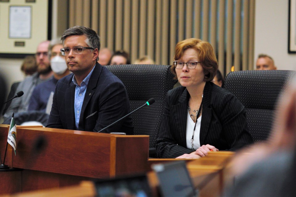 Chamber of commerce president Charla Robinson, right, and chair Riley Burton present to city council on Thursday. (Ian Kaufman, TBnewswatch)
