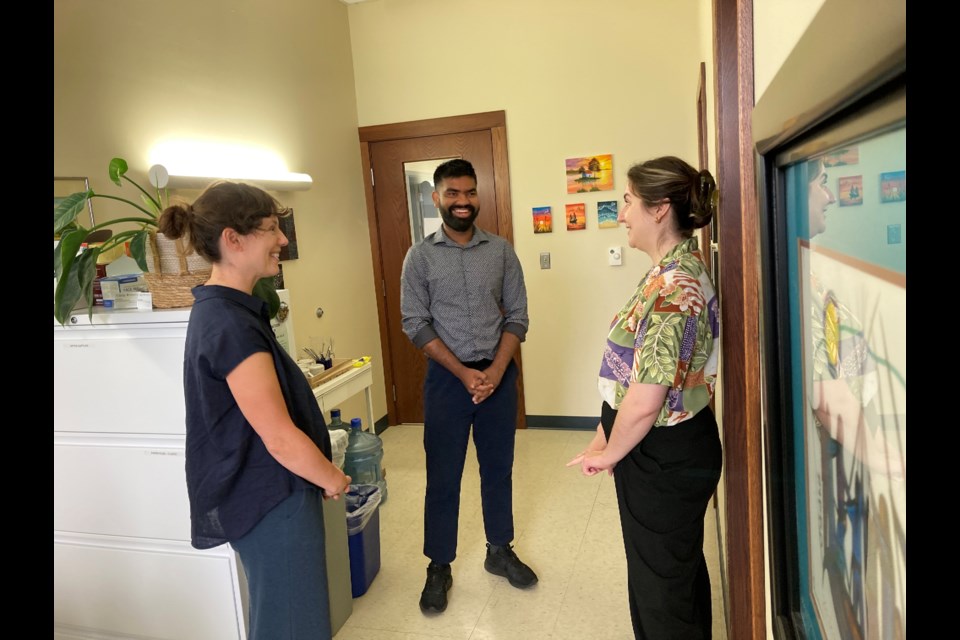 Jennifer Dagsvik, left, and Charlotte Bueckert-Dyck of the Newcomer Legal Clinic, have supported Kamal with immigration applications.