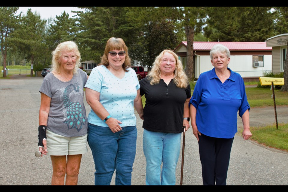 Hillcourt Estates residents Wendy Cooke, Mandy Bruyere, Marian Leat, and Kate Heasman say they struggle to understand the reasoning behind a proposed sale of the trailer park. (Ian Kaufman, TBnewswatch)
