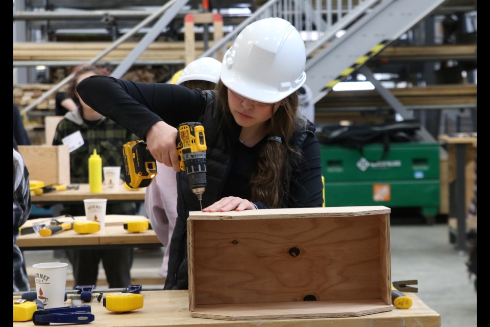 Female students from Superior CVI received some hands-on carpentry lessons at the Carpenters Union Training Centre on Wednesday. 