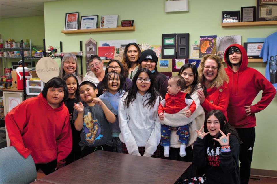 Clients and volunteers at Evergreen House in March. (File photo)