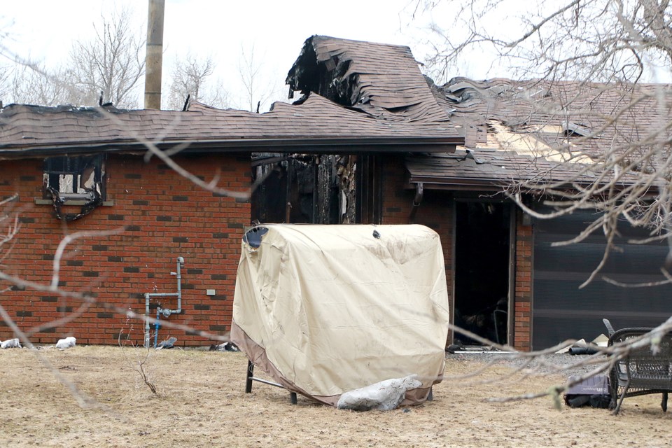A fire on Wednesday destroyed a Pole Line Road home. (Leith Dunick, tbnewswatch.com)