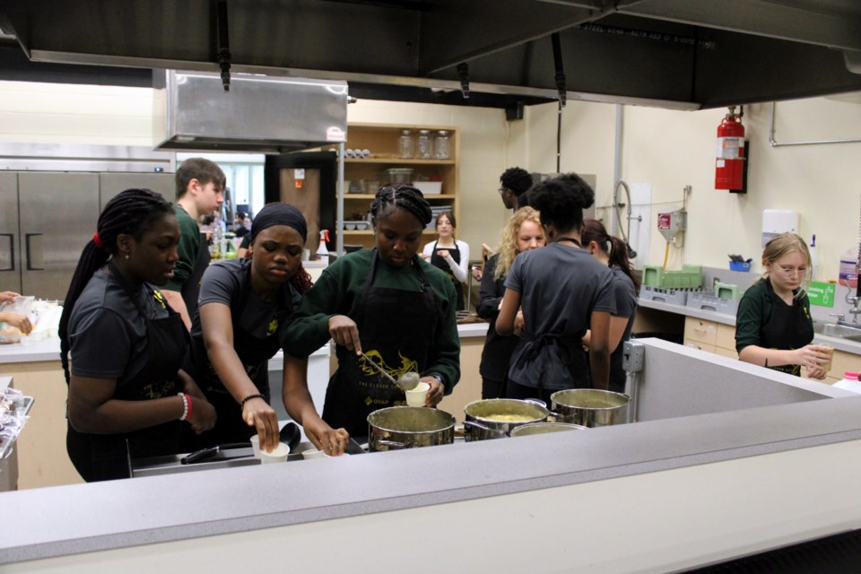 St. Patrick High School students put together meals and drinks during the opening of The Clover Café in the school’s cafeteria in October. The Café was one of the winners in last year's Tbaytel for Good Community Fund campaign. 