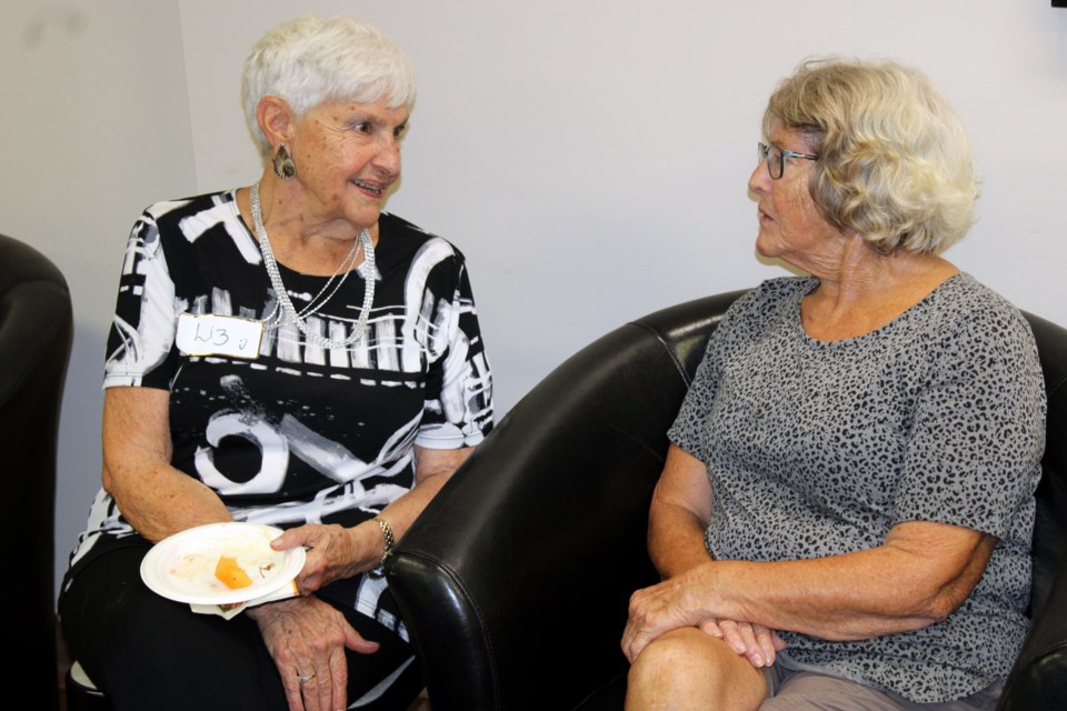 Liz Poulin, left, says the Oasis program has been a welcome addition to Bay View Towers.