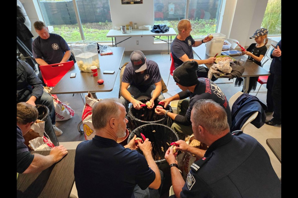 TB Firefighters volunteering to help prepare Thanksgiving dinner for the Salvation Army
