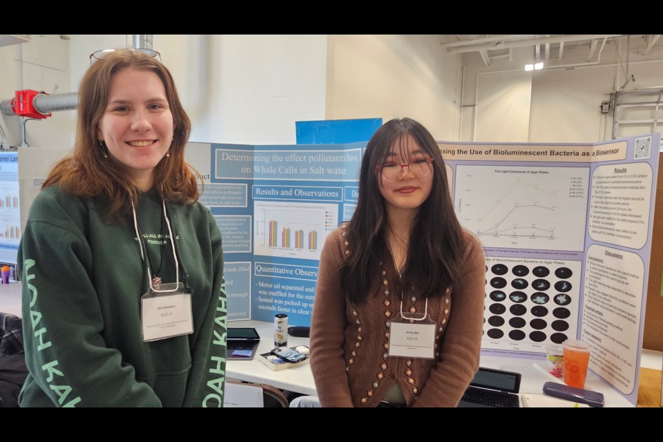 St. Ignatius grade 10 students, Via Kembel and Jenny Wu show off their projects at Northwestern Ontario Regional Science Fair at Confederation College