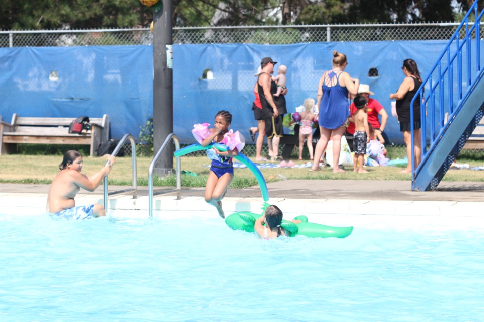 Residents enjoy time at the Heath Pool festival day each year. 