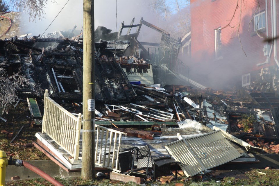 Thunder Bay Fire Rescue firefighters battle a house fire on Sunday, Dec. 1, 2024 on Crown Street