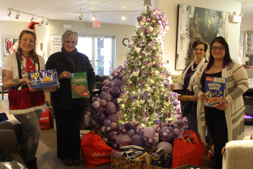 From left, Becca Chicorl, Carolyn Karle, Robbyn Fraser, Ashley Higgins