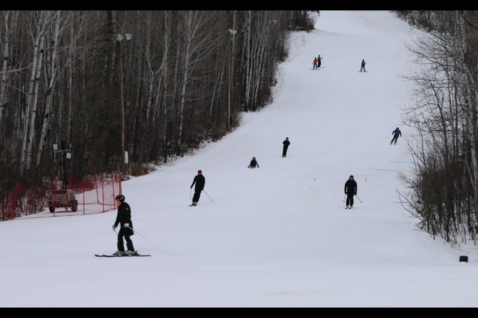 Skiers fill the slopes at Loch Lomond.