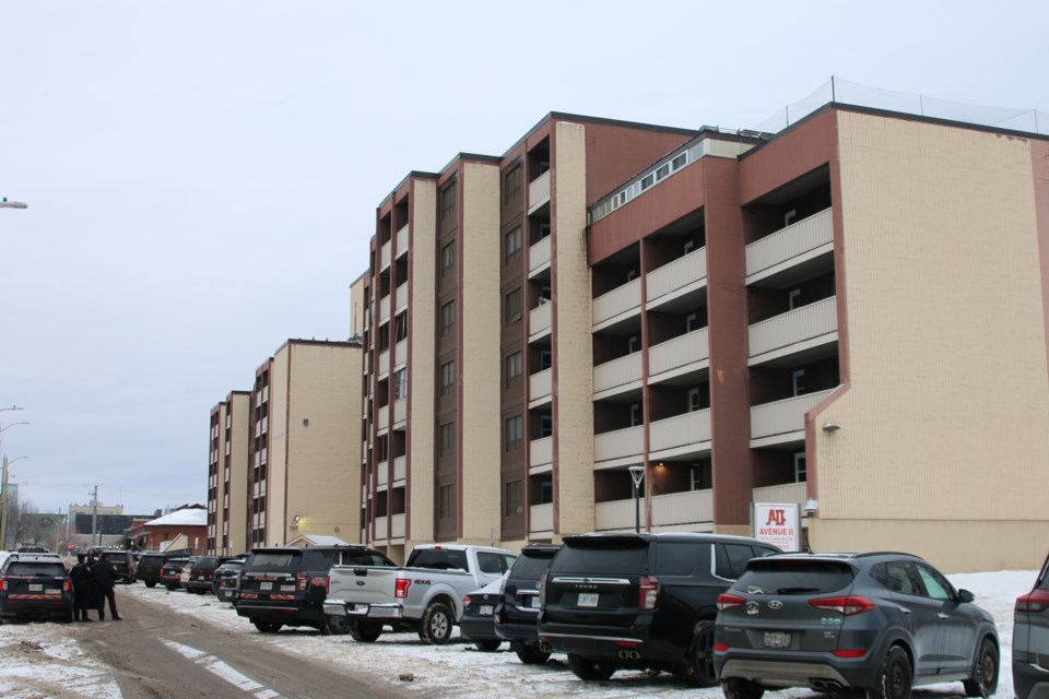 Nearly a dozen police cars are on the scene for an incident at an DSSAB apartment building on Jan. 17.