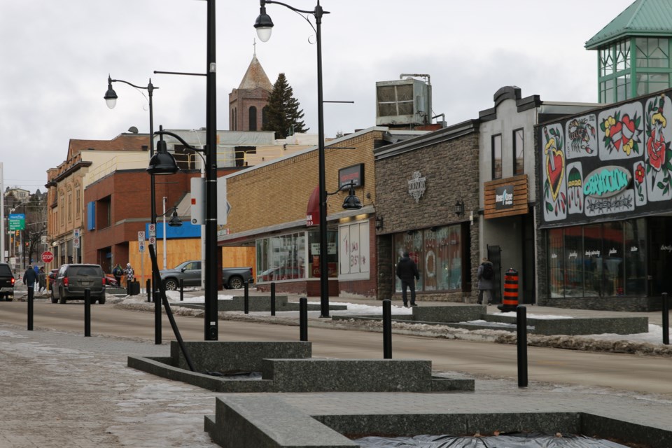 Thunder Bay residents travel down and shop on Red River Street on Dec. 31. 