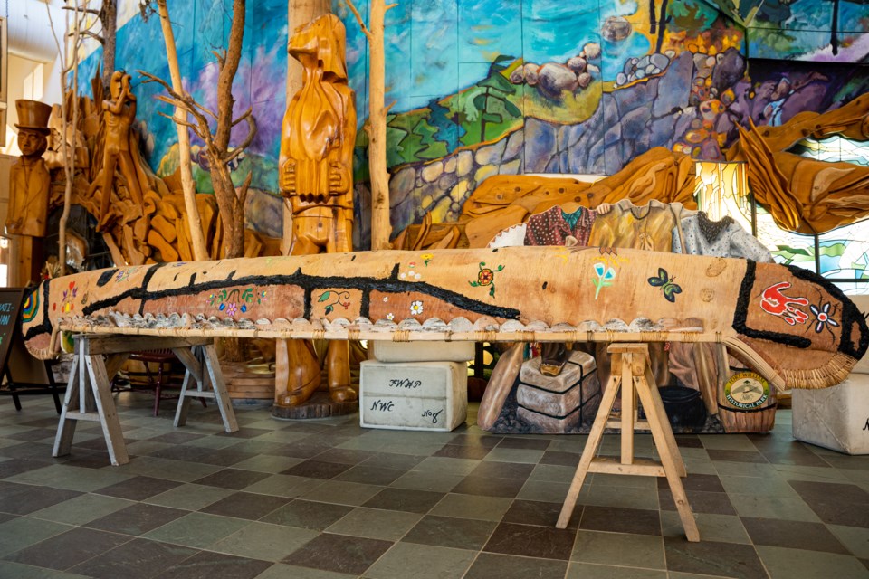 The finished birch bark canoe, which is named Bigwaji-waabiwan after the Wildflower song.
