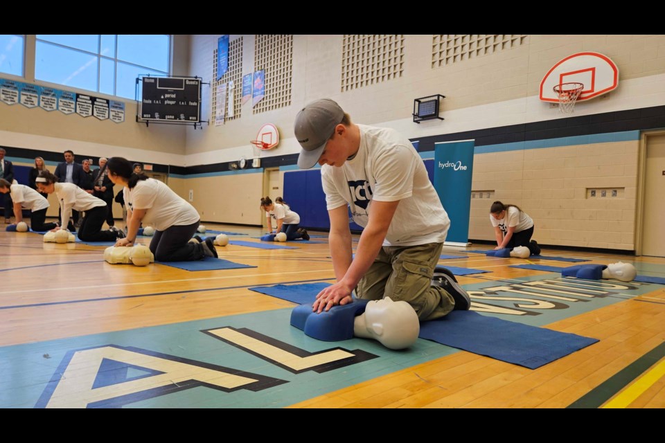 A student practising his CPR skills at Superior CVI. 