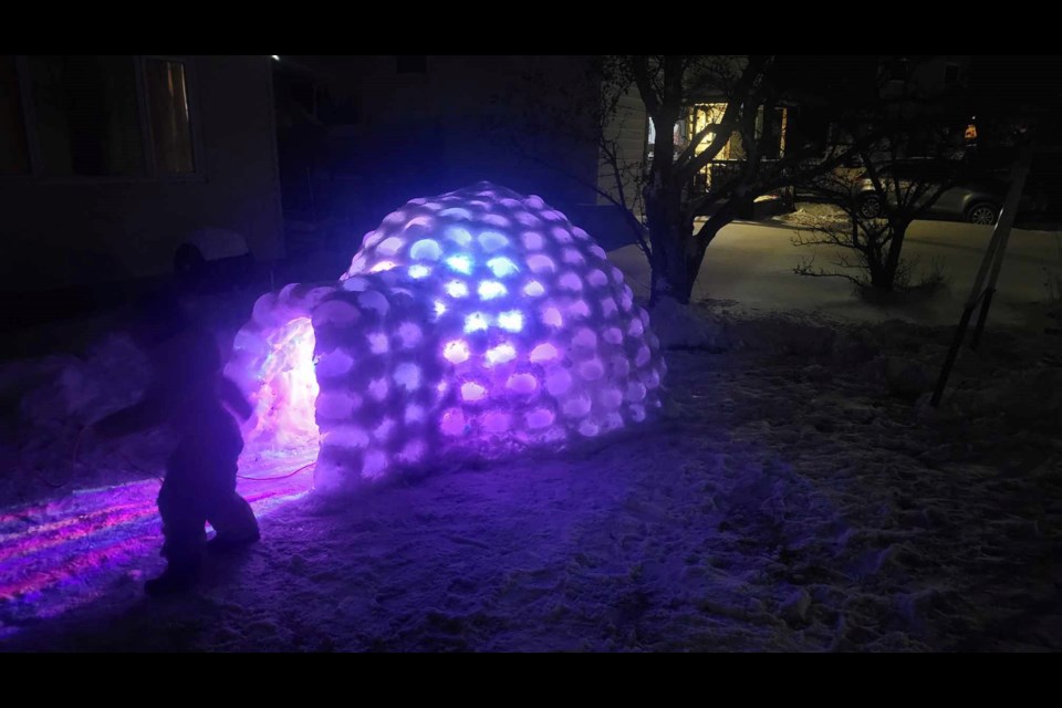 The igloo in the front yard of a Marathon home is an impressive sight when lit up at night (Abraxan Canada/Facebook)