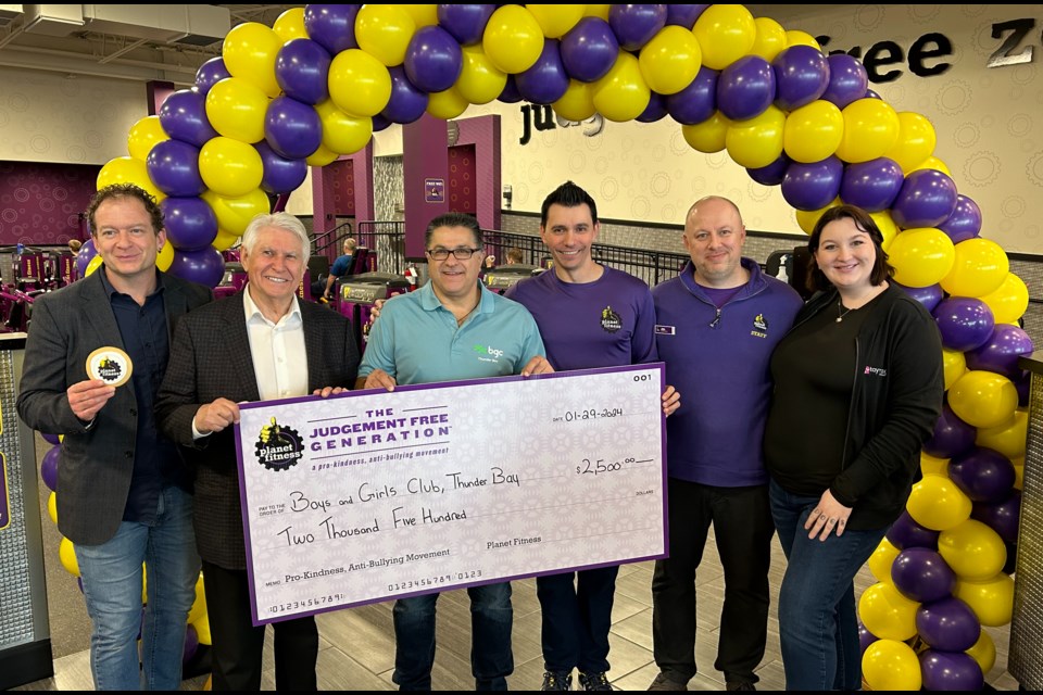 Planet Fitness presenting a cheque of $2,500 to the Boys and Girls Club during their grand opening on Monday, January 29, 2024