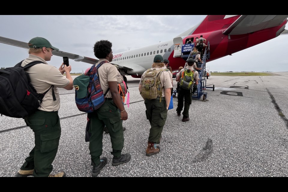 Fire rangers boarded a plane at Dryden airport for a flight to Alberta  (MNR/X)