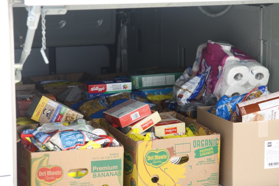 The Ontario Northland bus getting filled with food donations